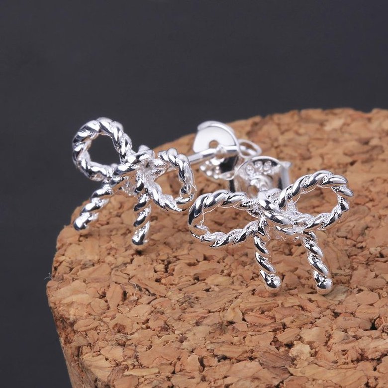 Wholesale Romantic Silver plated Sparkling BowKnot Twisted rope earrings Charm jewelry for Wome Gift TGSPE083 2